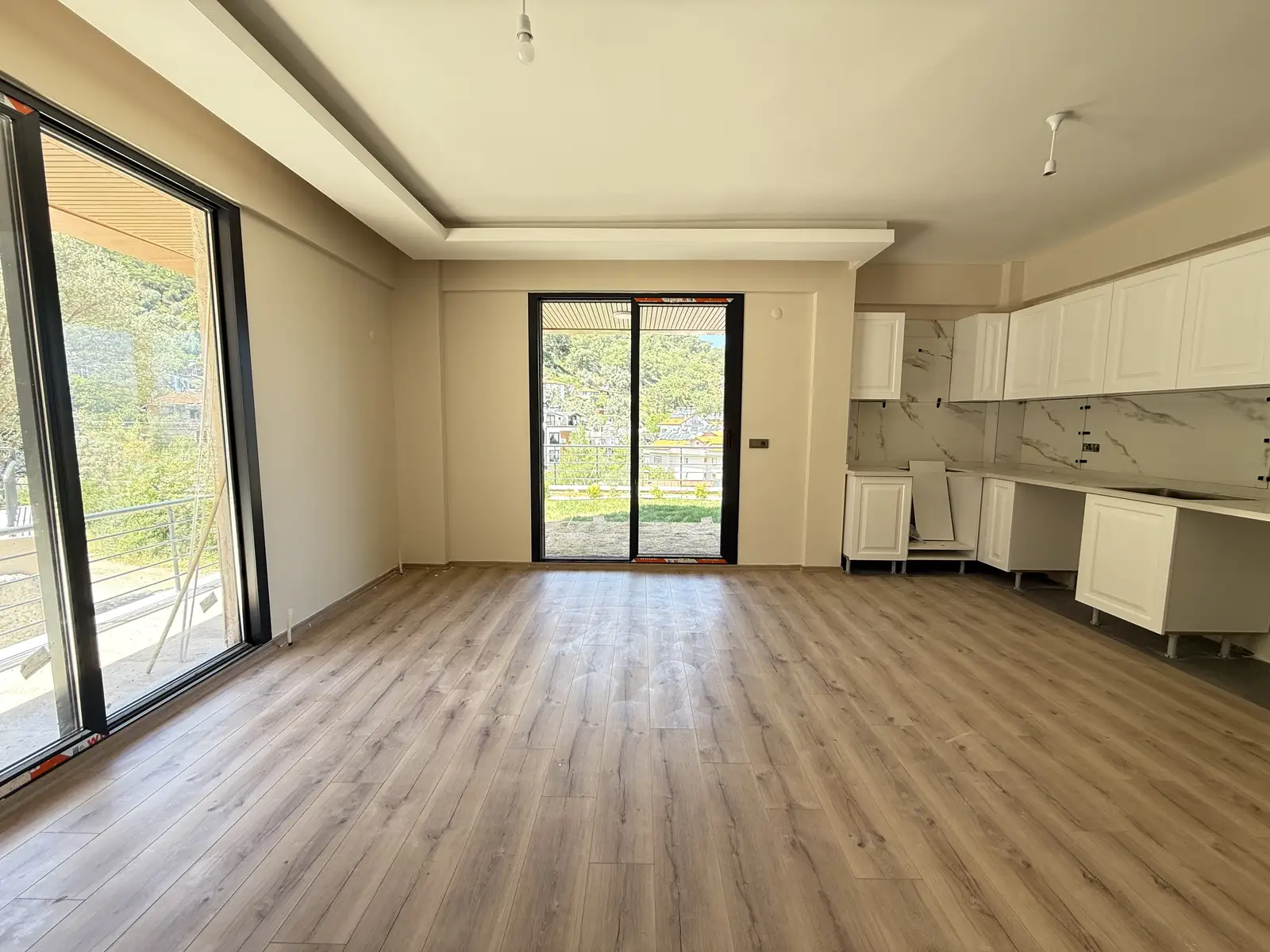 Fethiye Deliktaş’ta Merkeze Komşu, Modern Tasarımlı Satılık 2+1 Bahçe Katı Daire