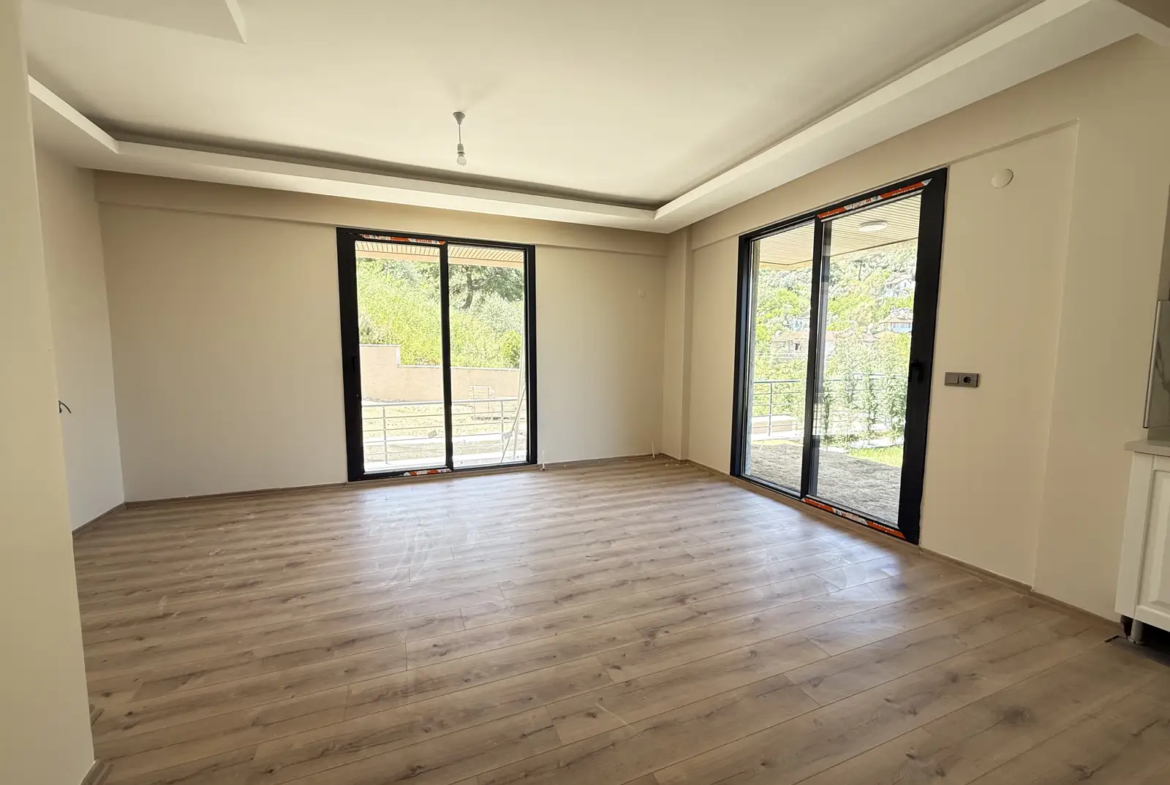 Fethiye Deliktaş’ta Merkeze Komşu, Modern Tasarımlı Satılık 2+1 Bahçe Katı Daire