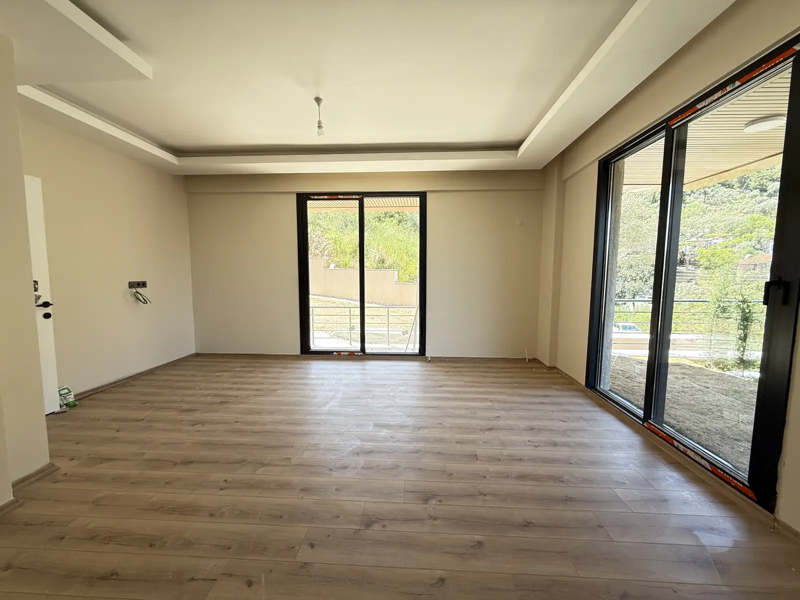 Fethiye Deliktaş’ta Merkeze Komşu, Modern Tasarımlı Satılık 2+1 Bahçe Katı Daire